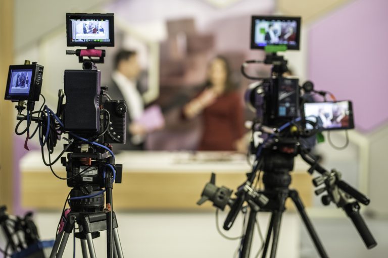 Two cameras filming